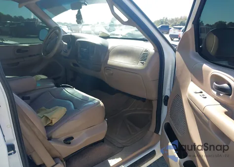 1999 Ford F150 z USA, uszkodzony, nr VIN 1FTRX18W0XNB46560